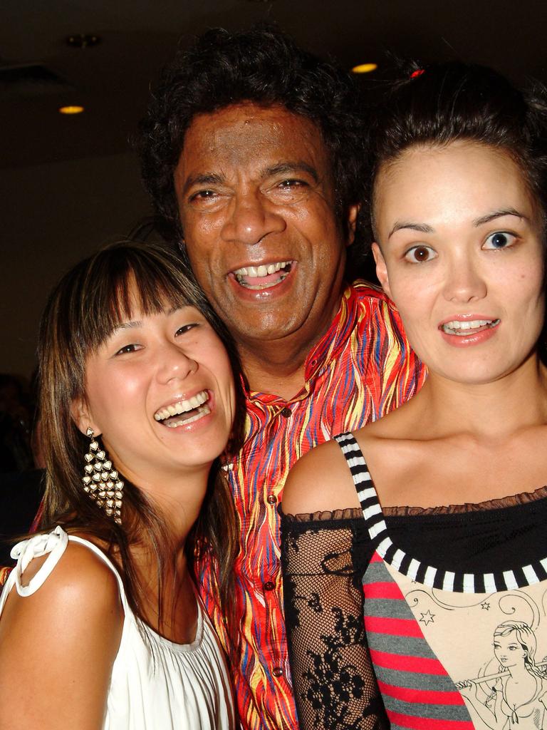 Kamahl, centre, with TV presenters Jade Skelly and Yumi Stynes at Big Day Out after-party at Sugar nightclub in 2006.