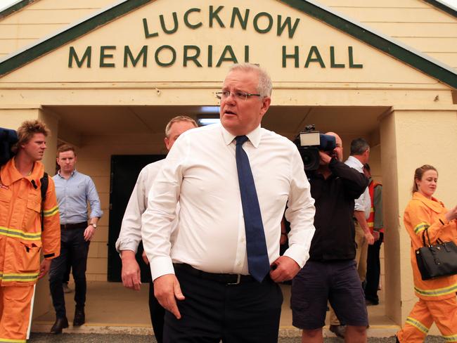 Prime Minister Scott Morrison visits the donations centre in Lucknow on the outskirts of Bairnsdale in Victoria. Picture: Aaron Francis