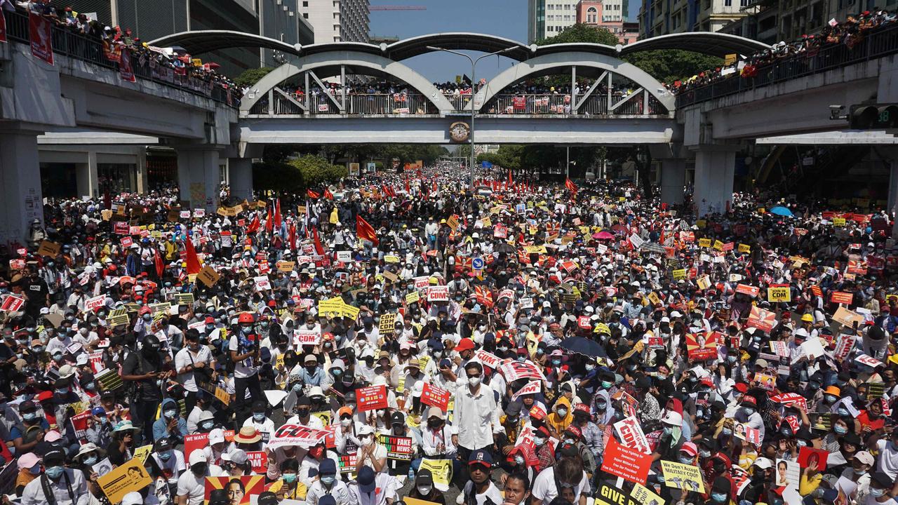 Protesters block a major road during a demonstration against the military coup in Yangon. Picture: Sai Aung Main / AFP