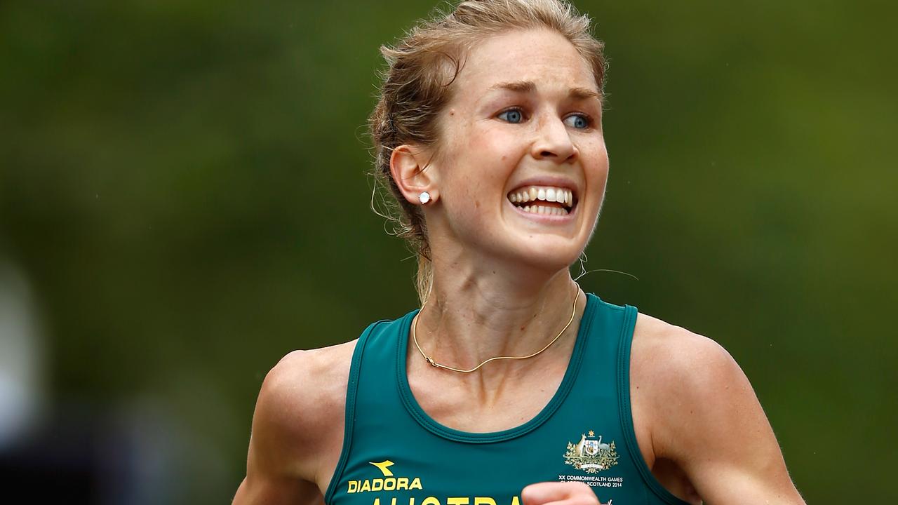 GLASGOW, SCOTLAND - JULY 27: Jess Trengove of Australia reacts after finishing third in the Women's Marathon on the city marathon course during day four of the Glasgow 2014 Commonwealth Games on July 27, 2014 in Glasgow, Scotland. (Photo by Clive Rose/Getty Images)