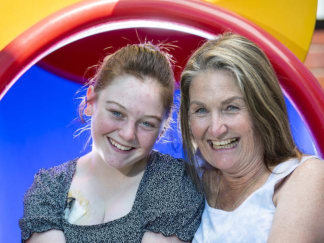 Jorja Crane 15 with mother Tanya Crane relax in the play area of Ronald McDonald House at North Adelaide ,Sunday,December,12,2021.Picture Mark Brake