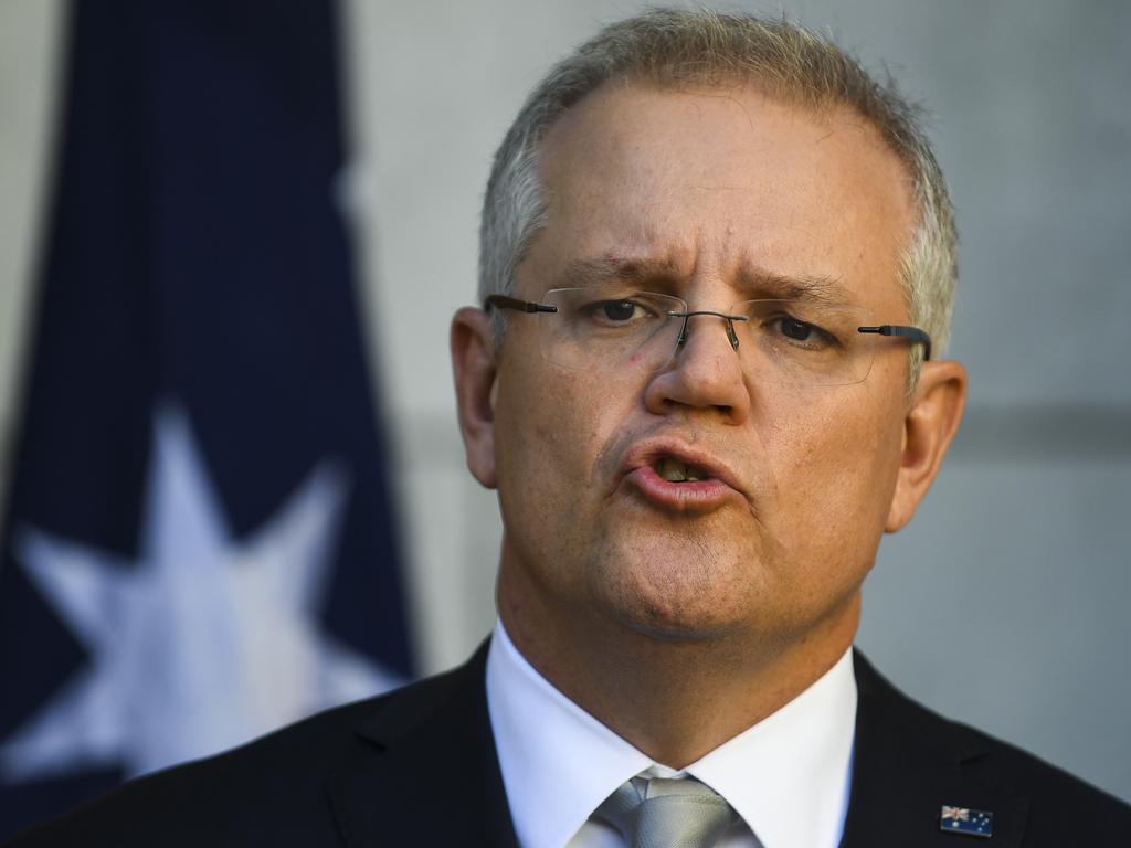 Australian Prime Minister Scott Morrison said there’s “no reason” why Queensland shouldn’t push ahead with reopening its borders next month. Picture: AAP Image/Lukas Coch.