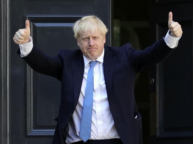 Newly elected leader of the Conservative party Boris Johnson arrives at Conservative party HQ in London, Tuesday, July 23, 2019. Brexit-hard-liner Boris Johnson, one of Britainâ€™s most famous and divisive politicians, won the race to lead the governing Conservative Party on Tuesday, and will become the countryâ€™s next prime minister in a little over 24 hours. (Aaron Chown/PA via AP)