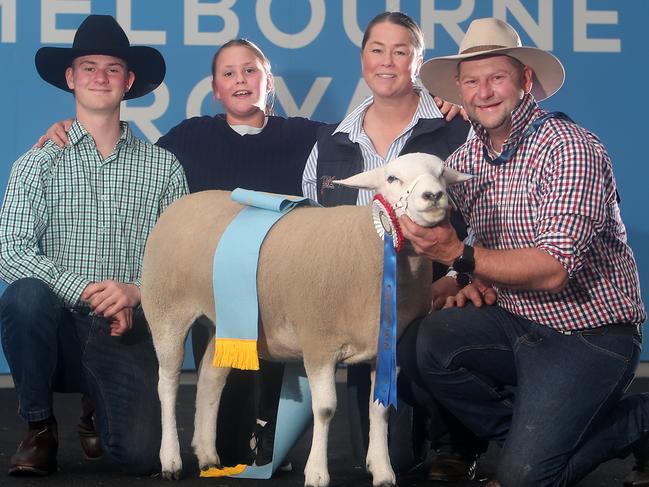 Patrick, Tamara, Charlie and Jason Stewart from Mt Pleasant, SA with the Supreme Champion Texel. Picture: Yuri Kouzmin