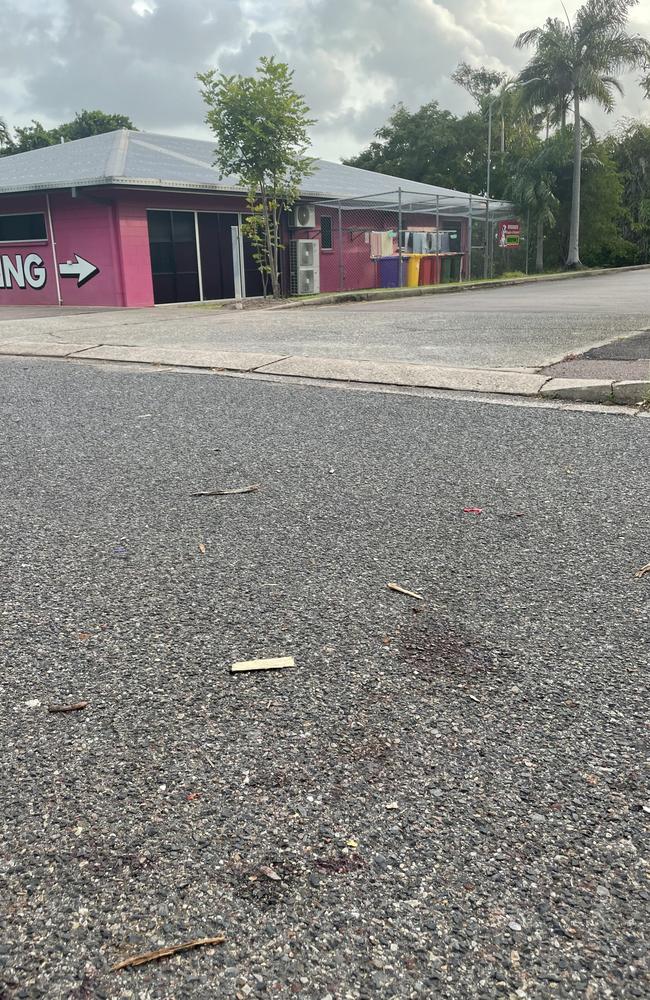 Blood stains in the carpark at the Rapid Creek Business Village where a man, believed to be in his 40s, was allegedly assaulted and later died from his injuries at the scene about 9.30pm. The popular precinct on Trower Rd was declared a crime scene overnight Tuesday, March 7, 2023. Picture: Annabel Bowles