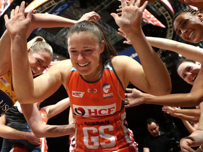 SYDNEY, AUSTRALIA - AUGUST 19: Susan Pettitt of the Giants runs through a guard of honour after announing her retirement during the Super Netball Preliminary Final match between the Giants and the Lightning at Qudos Bank Arena on August 19, 2018 in Sydney, Australia.  (Photo by Ryan Pierse/Getty Images)