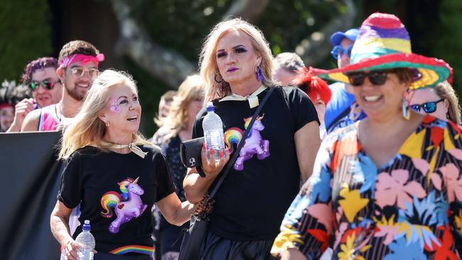 Dani Laidley and partner Donna Leckie marching along Fitzroy Street, St Kilda in the Melbourne Pride Festival. Picture: NCA NewsWire / Ian Currie