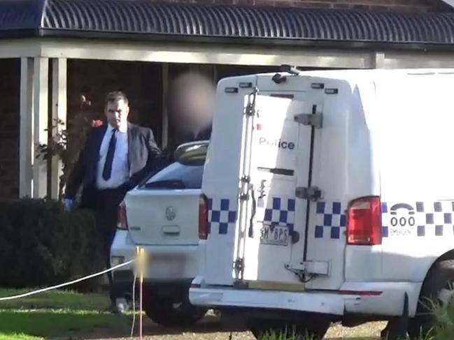 Detectives from the Echo Taskforce arrest an Ascot Vale man. Picture: Victoria Police