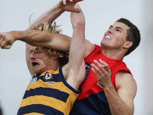 Nick Pavlou of Old Brighton spoils Old Melburnians’ Justin De Steige. Picture: Valeriu Campan