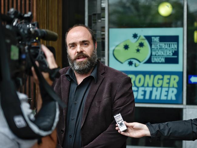 Victorian AWU branch secretary Ben Davis outside the West Melbourne offices being raided by federal police. Picture: Jason Edwards