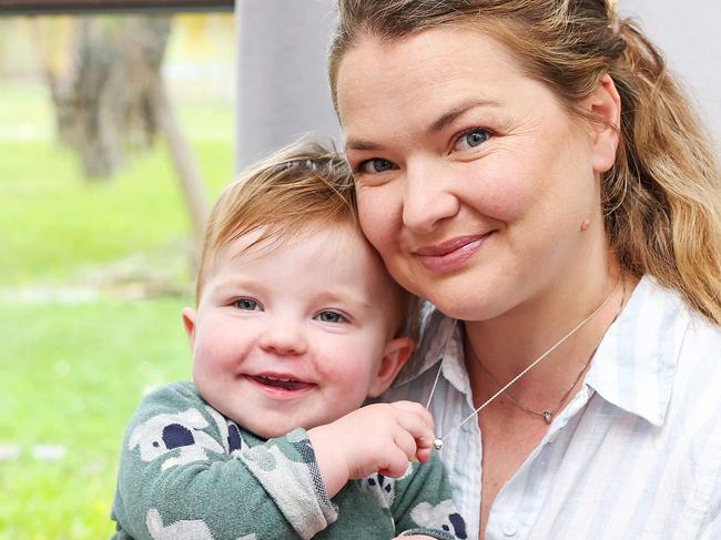 WEEKEND TELEGRAPH. MAY 31, 2024.Pictured at home in Bulli today is Liz Farthing with her 1 year old daughter Flossy. Picture: Tim Hunter.