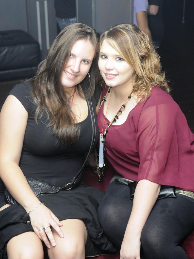 After dark – Gemma Misoa, left, and Amber Nevile at the Bojangles Nightclub in Gladstone. Photo Tom Huntley / The Observer