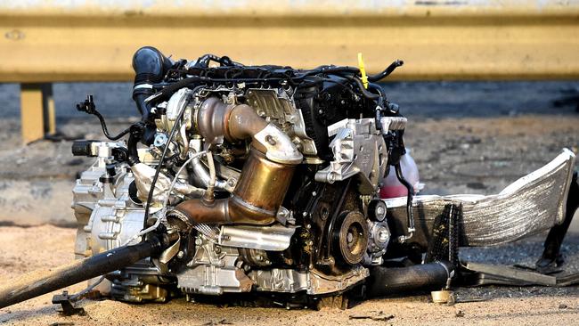 Wreckage was strewn across Palmers Rd from the impact of the crash. Picture: Nicole Garmston
