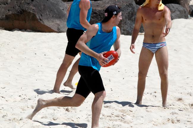 Ben McInneny with the Sherrin during the Southport Sharks VFL team during a preseason training camp at Tallebudgera Beach. Picture: Mike Batterham.