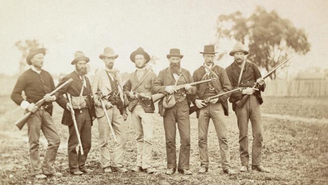 Some of the Kelly hunters after bringing down Ned Kelly in his last shootout at Glenrowan in 1880. Picture: State Library of Victoria