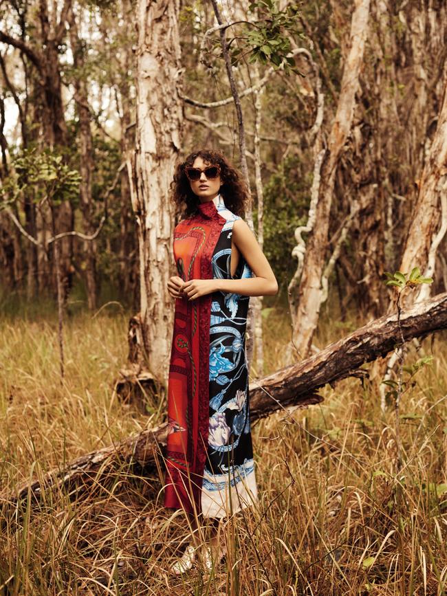 Salvatore Ferragamo scarf-print side-stud silk dress; Christian Louboutin metallic mules; Dolce &amp; Gabbana sunglasses.