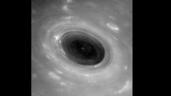 This unprocessed NASA handout image released April 27, 2017, shows features in Saturn's atmosphere from closer than ever before.