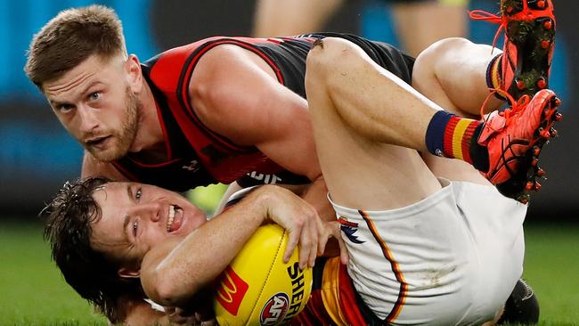 Jayden Laverde brings James Rowe to the ground in a tackle at the weekend. Picture: AFL Photos via Getty Images