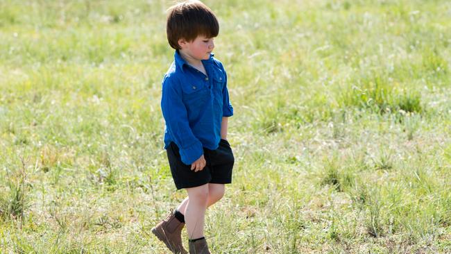 Memphis Francis, 3, on his grandparent’s property near Griffith in New South Wales. Picture: Ginette Guidolin