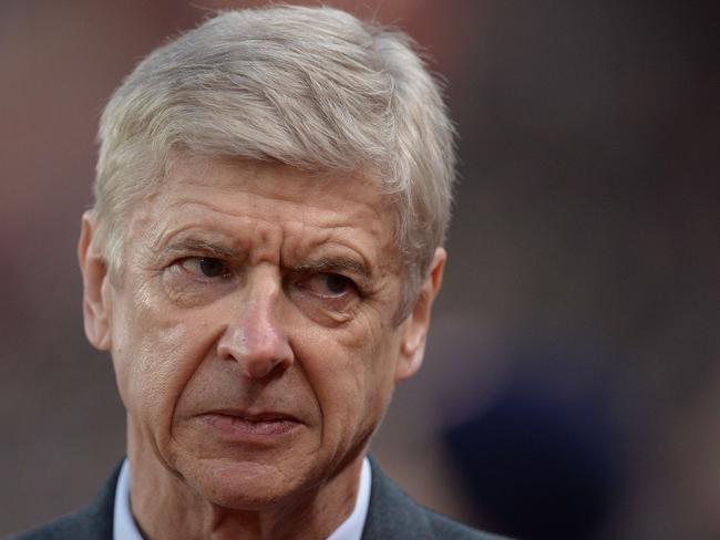 Arsenal's French manager Arsene Wenger reacts ahead of the English Premier League football match between Stoke City and Arsenal at the Britannia Stadium in Stoke-on-Trent, central England on January 17, 2016. AFP PHOTO / OLI SCARFF RESTRICTED TO EDITORIAL USE. No use with unauthorized audio, video, data, fixture lists, club/league logos or 'live' services. Online in-match use limited to 75 images, no video emulation. No use in betting, games or single club/league/player publications..