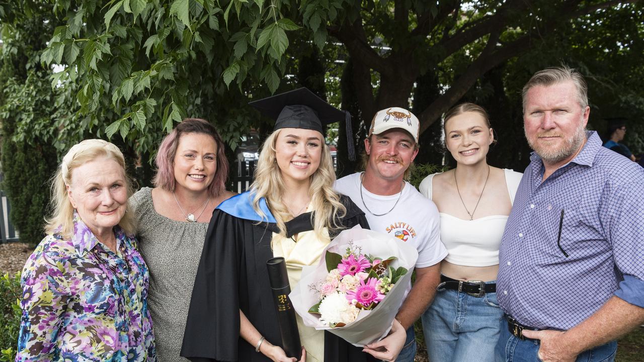 Bachelor of Nursing graduate Holly Lowe with (from left) Lynnette Dwyer, Belinda Lowe, Daniel Blanck, Alecia Lowe and Adam Lowe at a UniSQ graduation ceremony at Empire Theatres, Tuesday, February 13, 2024. Picture: Kevin Farmer