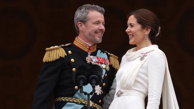 COPENHAGEN, DENMARK - JANUARY 14: Danish King Frederik X and wife Queen Mary of Denmark after his proclamation by the Prime Minister, Mette Frederiksen on the balcony of Christiansborg Palace on January 14, 2024 in Copenhagen, Denmark. King Frederik X is succeeding Queen Margrethe II, who will be stepping down after reigning for 51 years. (Photo by Sean Gallup/Getty Images)