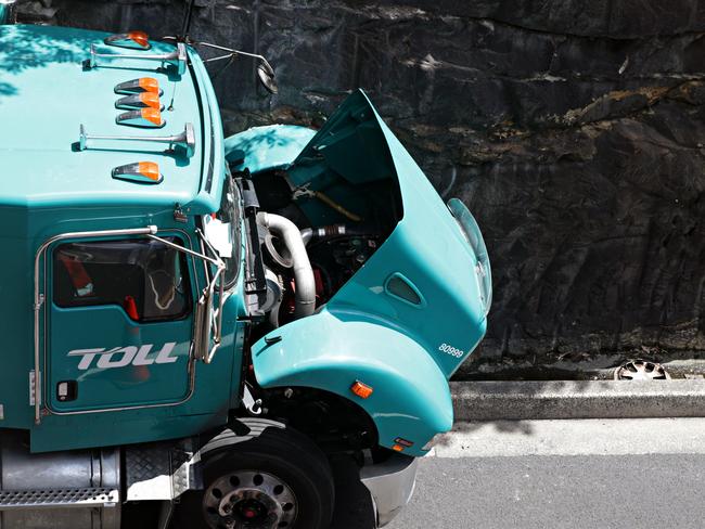 The tanker’s prime mover was badly damaged — it took authorities more than 12 hours to remove it from Manly Rd. Picture: Adam Yip