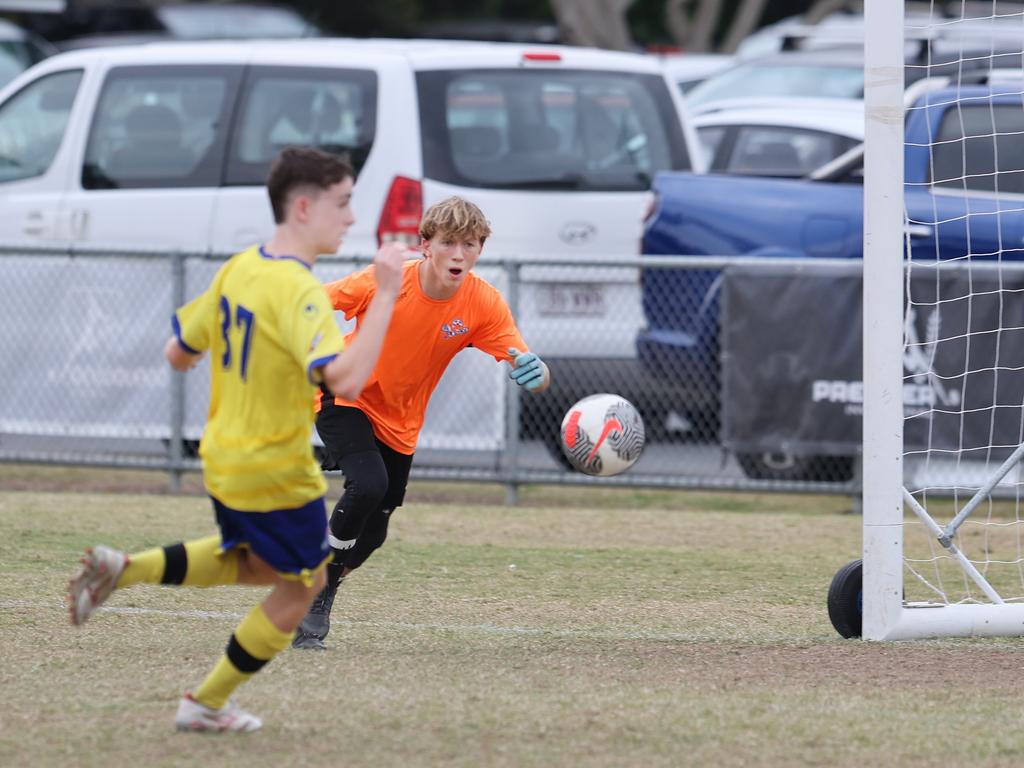 Premier Invitational Football 2024 tournament at Glennon Park Nerang. Field 1...Selwyn Utd (blue) V Brisbane Strikers (Yellow). Picture Glenn Hampson