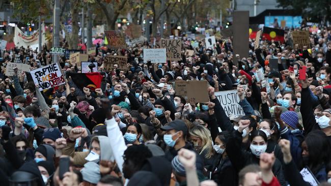 Many protesters wore masks, but the large turnout made it impossible to social distance. Picture: Alex Coppel.