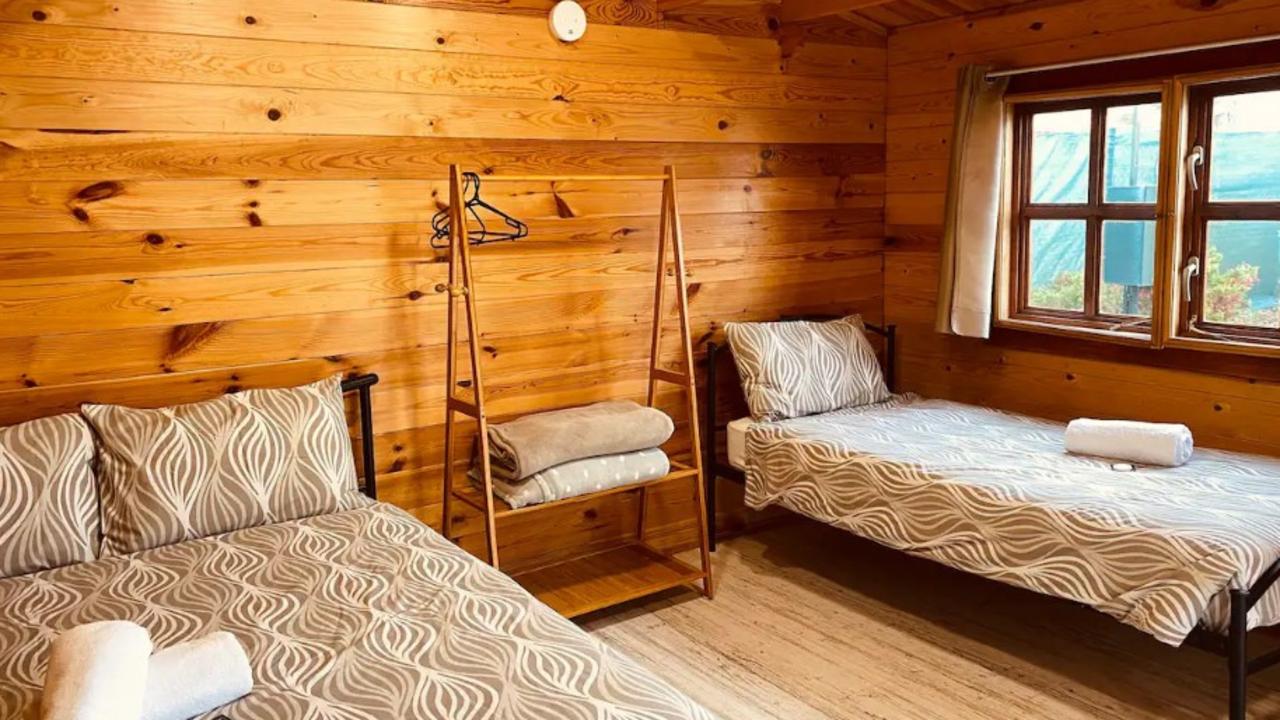 This wooden cabin is one of 50 affordable Airbnbs still available for the Easter long weekend. Picture: Airbnb