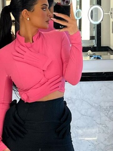 She paired the magenta top with a black mini skirt. Picture: Instagram