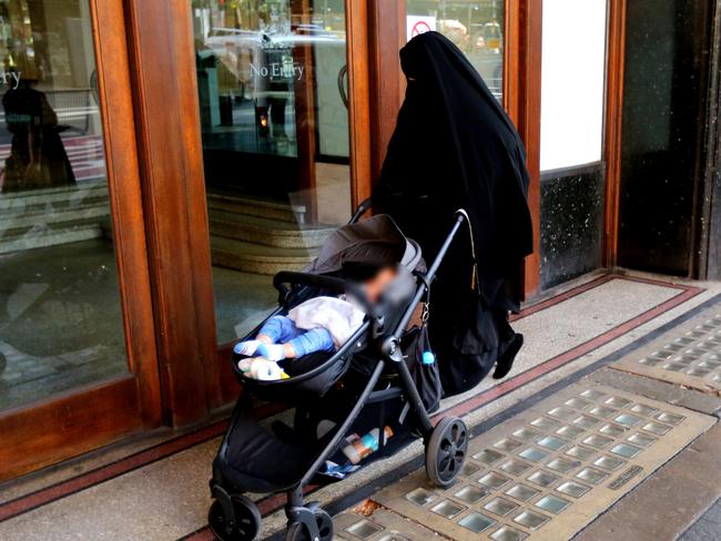 Unidentified person leaving the Downing Centre, believed to be supporter of the accused. Picture: Rohan Kelly