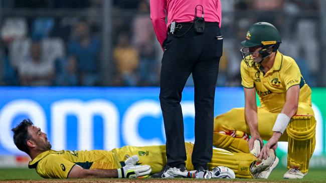 Maxwell battles cramps during his double century epic. Picture: INDRANIL MUKHERJEE / AFP