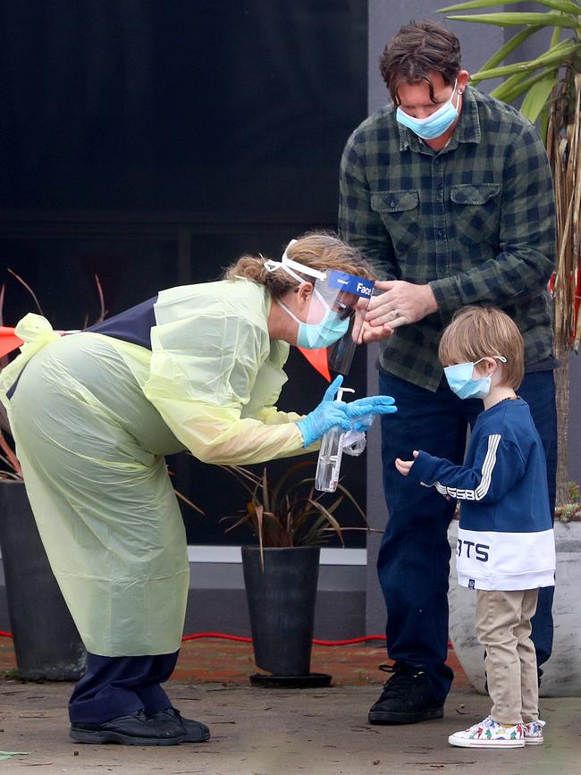 A young child turns up for testing at Epichealth Ocean Grove in Melbourne.