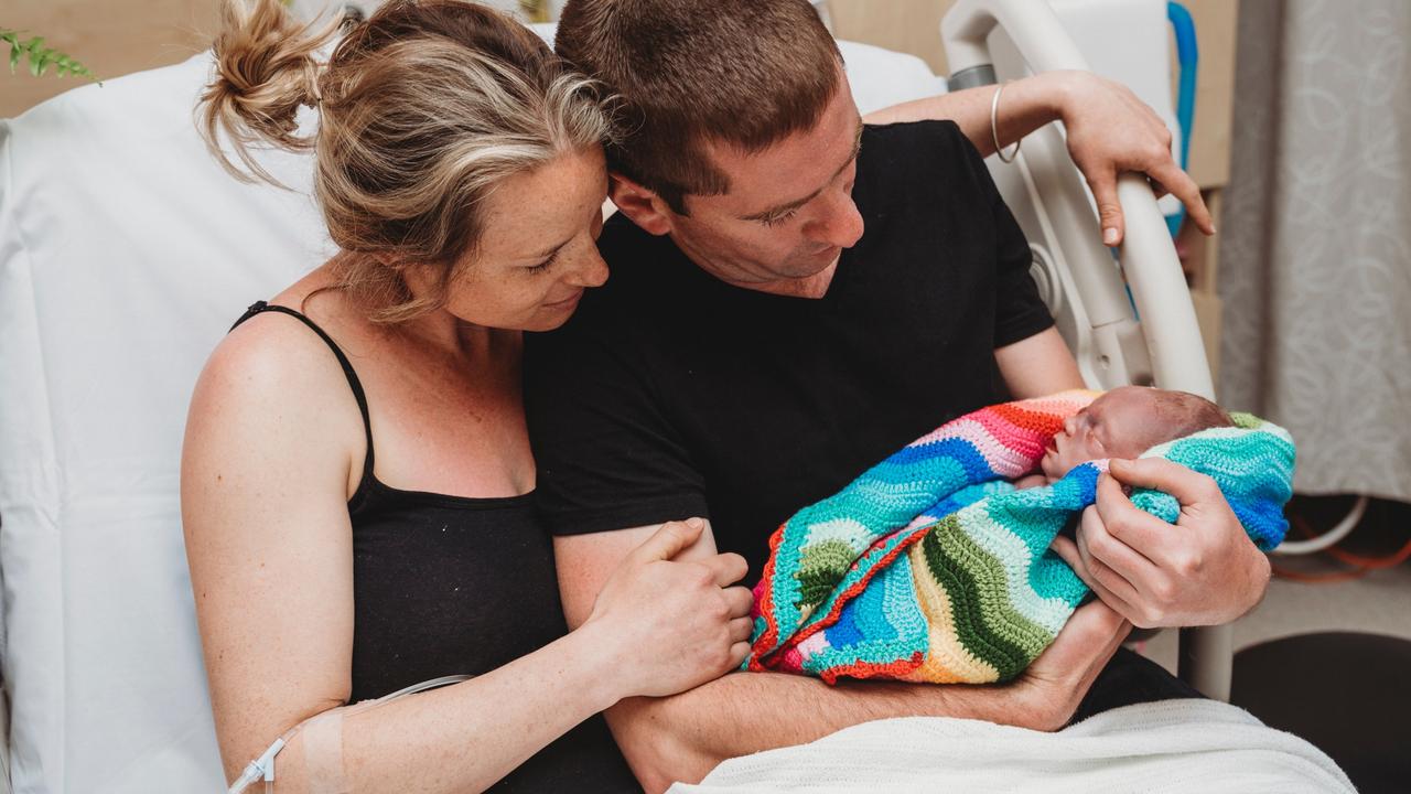 Mrs Castor and her husband with baby Vincent.