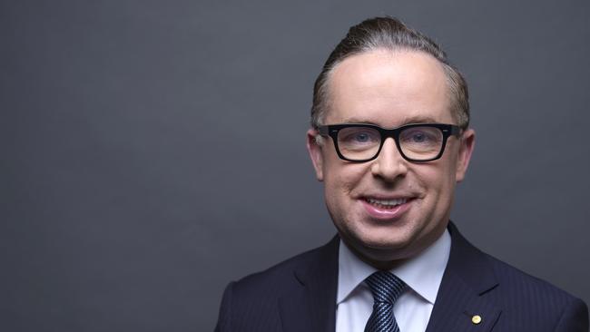 Alan Joyce, chief executive officer of Qantas Airways Ltd., poses for a photograph ahead of a Bloomberg Television interview in Hong Kong, China, on Monday, Nov. 12, 2018. JoyceÃÂ said the airline's cash flows are enough to fund capital expenditure, shareholder returns and manage debt, even as the annual fuel bill creeps up. Photographer: Justin Chin/Bloomberg via Getty Images