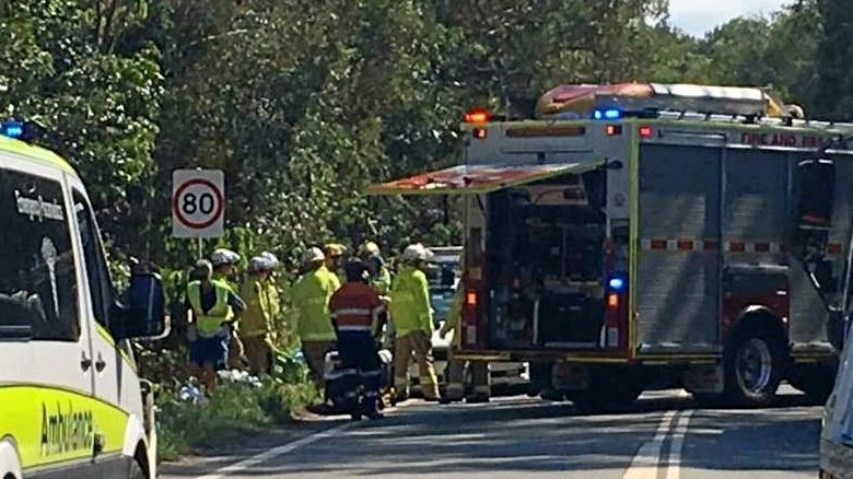 Woman cut free from truck crash wreckage | The Courier Mail