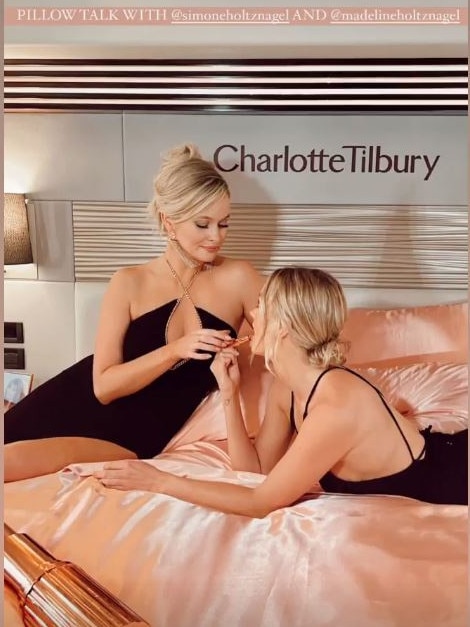 Simone posing on a bed inside the fancy yacht with her sister Madeline, 26, who is also a model. Picture: Instagram/simoneholtznagel