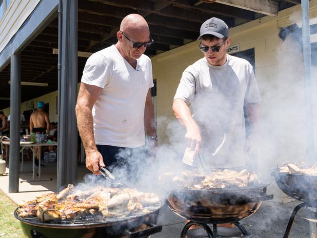 Matt Moran working with Roosters players on food prep. Supplied