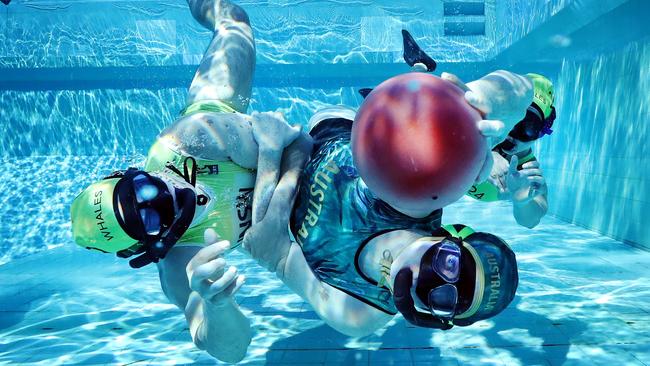 DAILY TELEGRAPH 11TH SEPTEMBER 2023 Pictured with the ball at Leichhardt Park Aquatic Centre is Ben Maslen and members of the UNSW Whales underwater rugby team. Inner West Council has broken its promise to include a deep diving pool in its redevelopment of Leichhardt Pool. This broken commitment is terrible for the NSW diving community, and unique sports like underwater rugby as they need the 5 metre + depth to do their sports. Picture: Richard Dobson