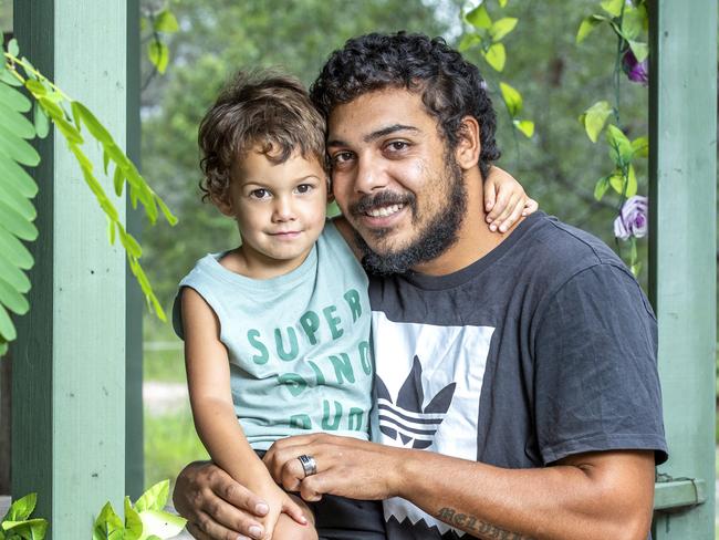 Aaron Melville with three-year-old Omari on their Jimboomba property, Sunday, January 10, 2021 - Picture: Richard Walker