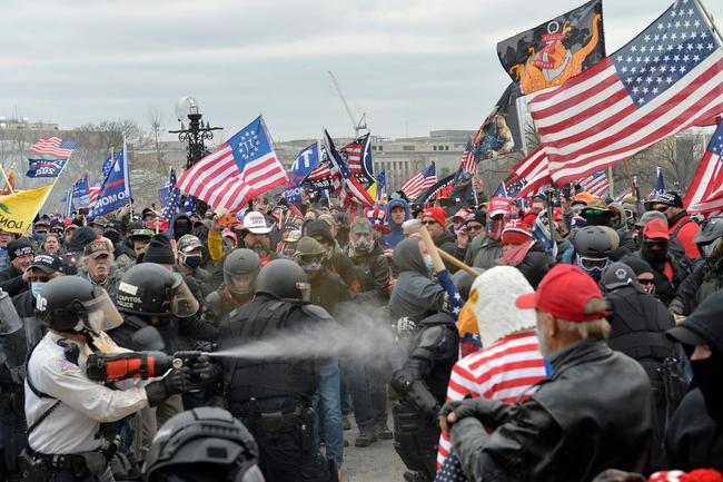 Trump supporters clash with police and security forces as people try to storm the US Capitol Building in Washington, DC. Pictuire: Joseph Prezioso / AFP