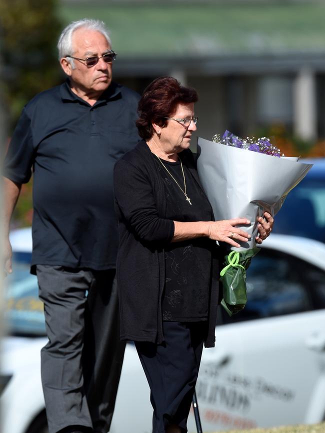 Borce Ristevski’s parents, Kosdadin and Nevana, arrive with flowers. Picture: Nicole Garmston