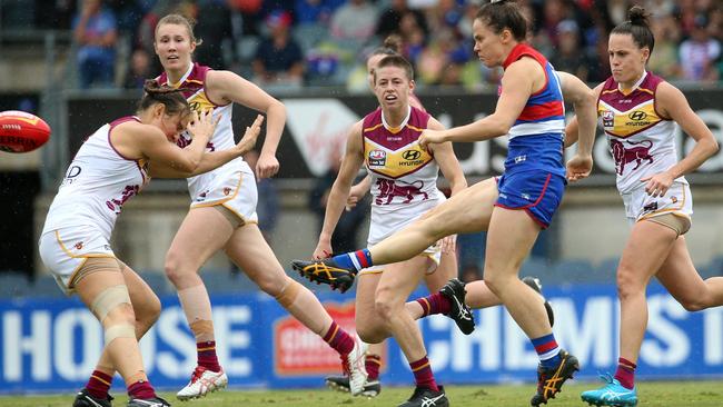 Emma Kearney of the Bulldogs kicks forward during the AFLW grand final match between the Western Bulldogs and the Brisbane Lions at Ikon Park in Melbourne. Picture: AAP