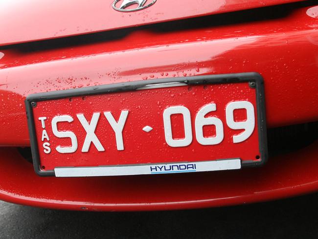 Custom registration plates, a personalised number plate on a SXY 069