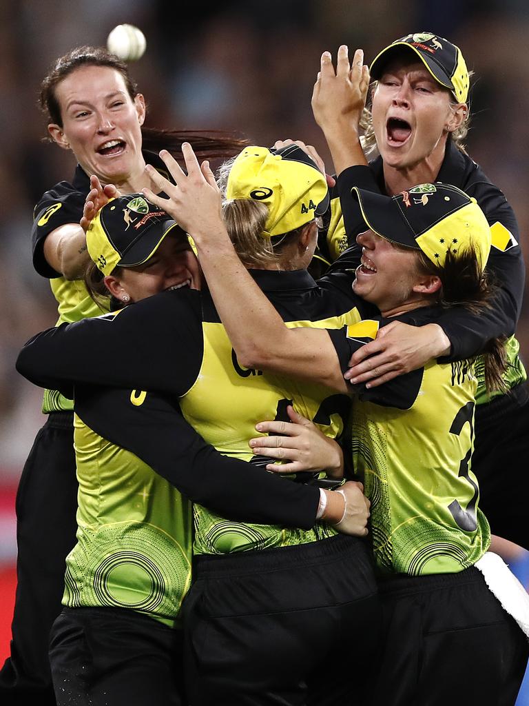 Australia’s cricketers celebrate their T20 World Cup triumph.