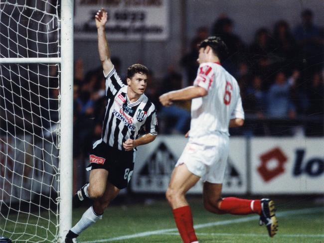 Carl Veart celebrates scoring a goal for Adelaide City. Picture: Nicholas Wilson