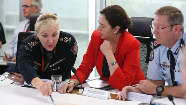 Katarina Carroll with Premier Annastacia Palaszczuk and Bob Gee at a meeting in preparation for Tropical Cyclone Nora. Picture: Annette Dew