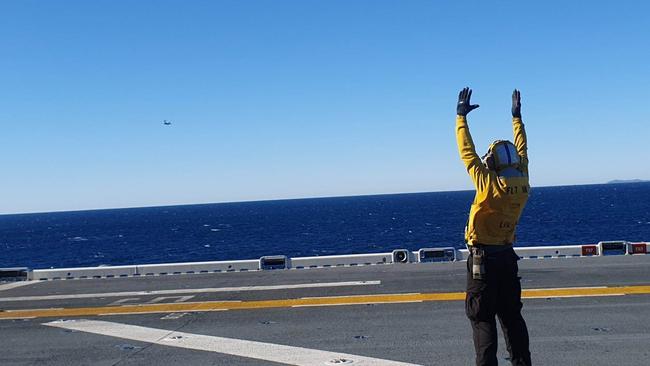 A United States Marine Corps MV-22 Osprey prepares to land on the flight deck of the USS America just outside of Brisbane on Tuesday. Picture: Jodie Munro O'Brien