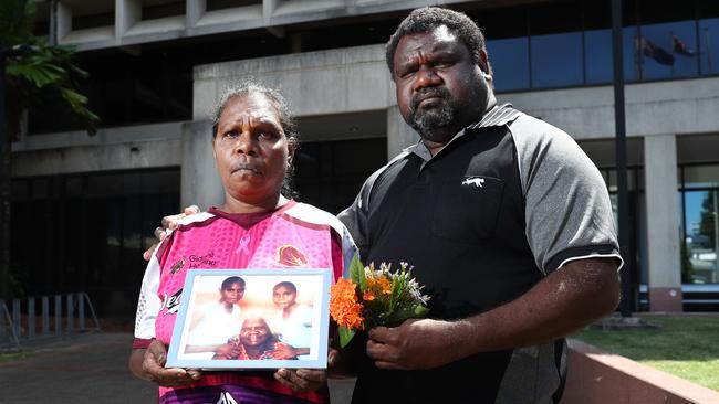 Alison Bernard's mother and uncle Edwina Bernard and Teddy Bernard with a photo of Allison (left) with her grandmother and sister. Picture: Brendan Radke.